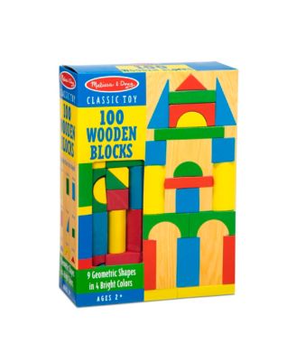 Melissa & Doug 100-Piece Painted Wood Blocks Set box and assembled colorful wooden block structure with geometric shapes in red, blue, yellow, and green