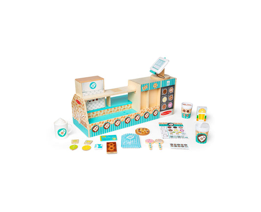 Wooden cafe playset with turquoise and natural wood construction, featuring a counter with register, oven, and shelving, plus 35 accessories including cups, coo