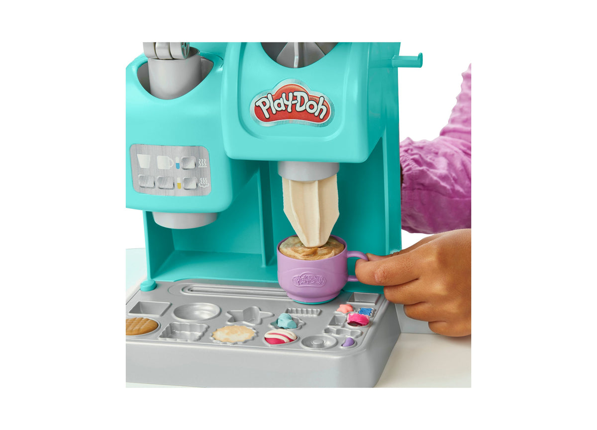 Play-Doh Kitchen Creations Colorful Cafe Playset in turquoise with purple mug, featuring coffee maker and topping sta...