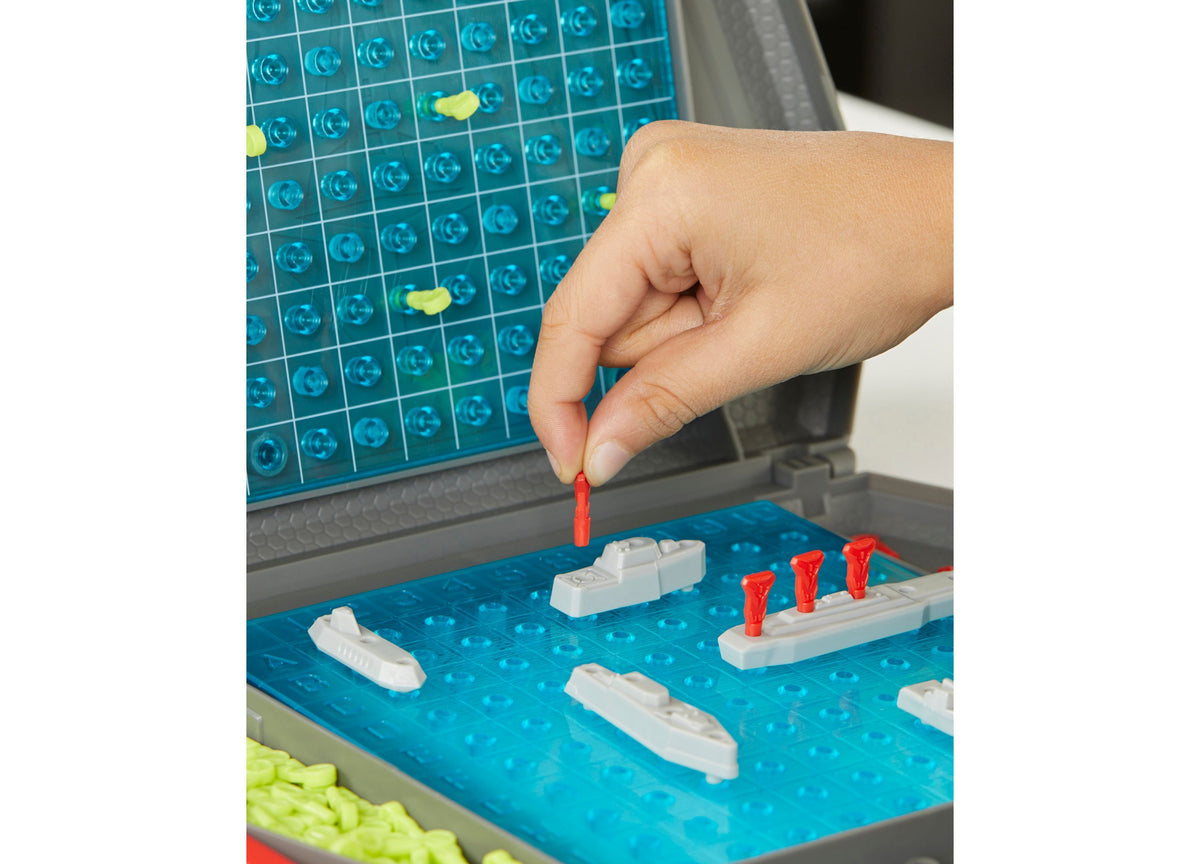 Battleship Classic Naval Combat Strategy Board Game with red pegs and white ships on blue battle case