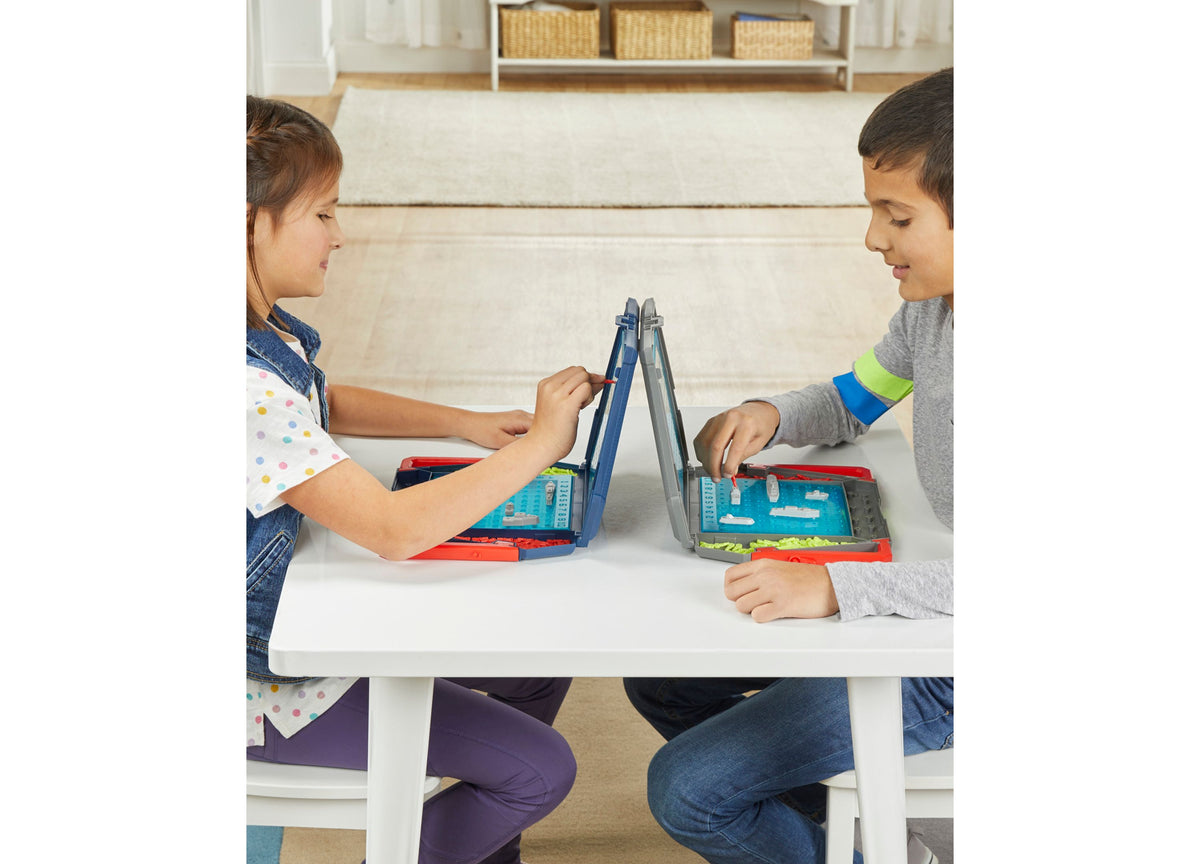 Hasbro Battleship Classic Naval Combat Strategy Board Game with two children playing, blue and red battle cases open