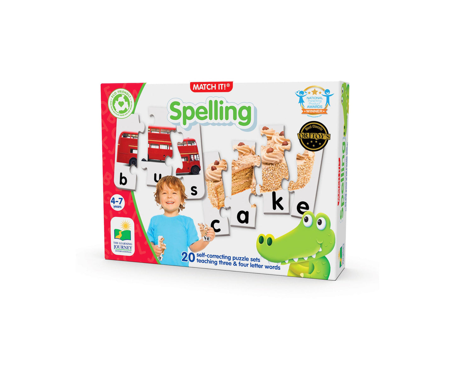 Match It! Spelling learning puzzle game box with child modeled holding puzzle pieces, red bus images, letter tiles, and green crocodile character, 20 self-corre