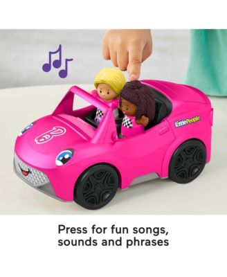 Fisher Price Little People Barbie Convertible Playset in bright pink with two Barbie-themed figures