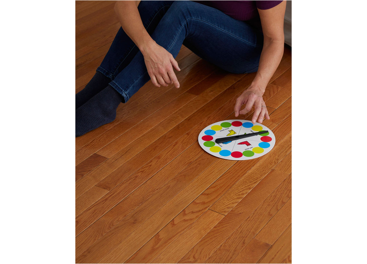 Twister Game Classic with colorful spinner mat featuring red, yellow, blue, and green spots