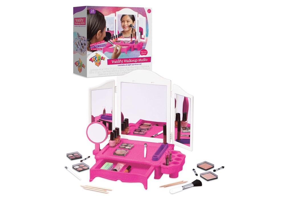 Vanity Makeup Studio with pink tri-fold mirror, LED light-up feature, cosmetics, brushes, and makeup accessories on display