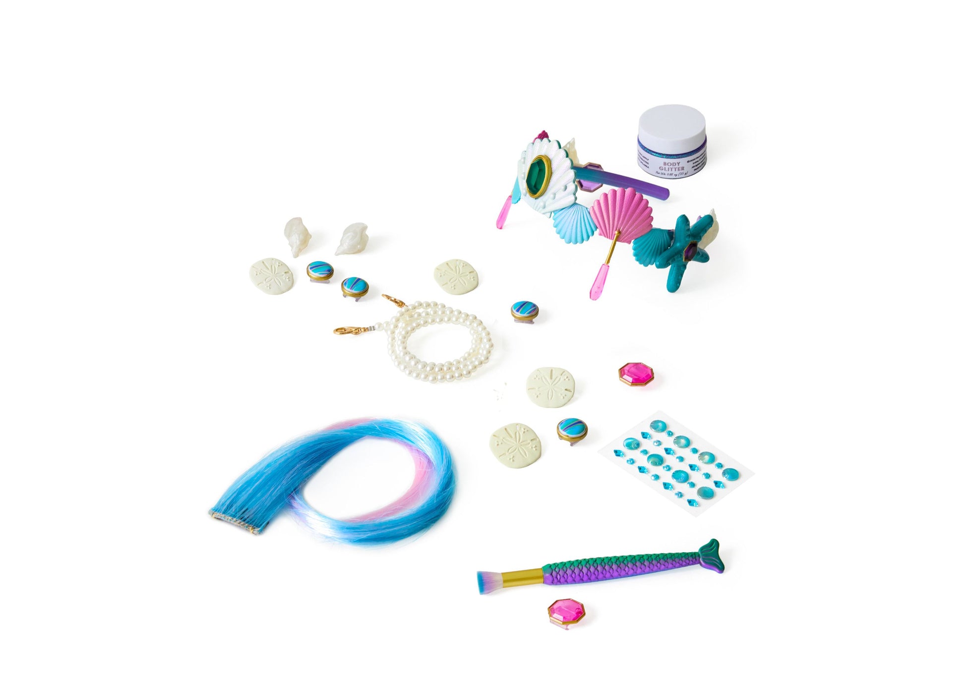 Mermaid-themed accessory set with blue and pink hair clips, pearl beaded bracelet, colorful seashell charms, starfish accessories, glitter jar, jeweled gems, an