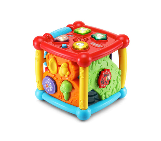 Colorful activity cube with red top panel featuring light-up buttons, yellow legs, blue base, and orange and green sides with interactive learning features
