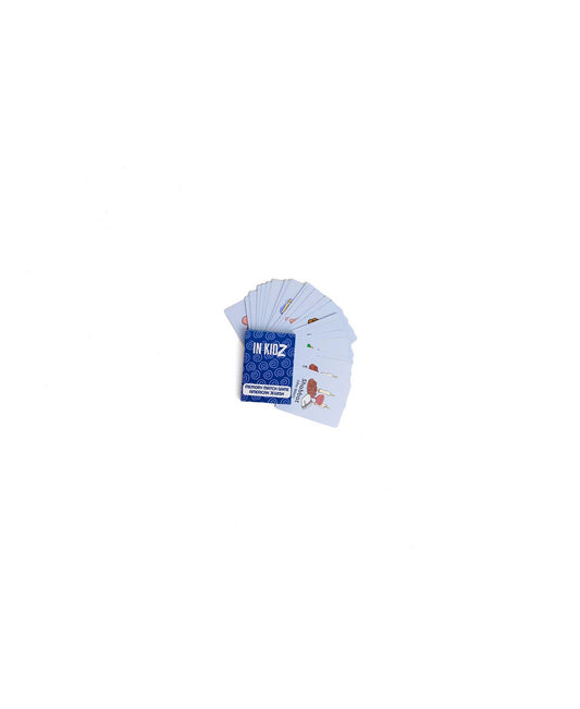 In KidZ Culturez American Jewish Exploration Kit card game fanned out showing blue box and illustrated cards on plain background