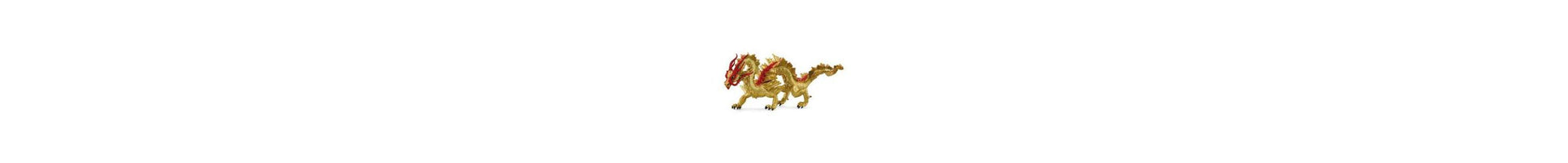 Gold and red dragon figurine on plain white background