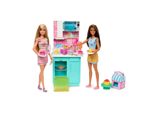Two Barbie dolls with colorful kitchen playset including turquoise oven, pink microwave, cooking accessories, and cupcake carrier