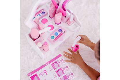 Melissa & Doug Beauty Salon Play Set with pink accessories, brushes, and nail polish colors