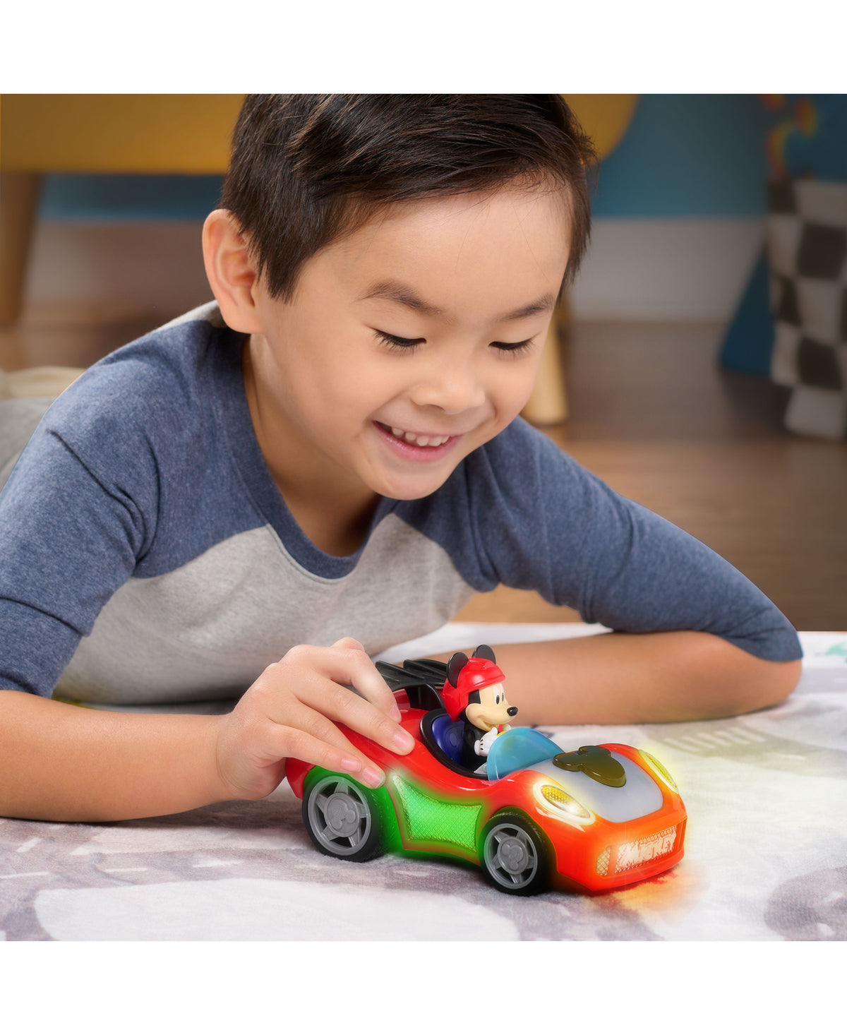 Mickey Mouse Rev 'N Go red and green motorized car with Mickey figure, lights and sounds