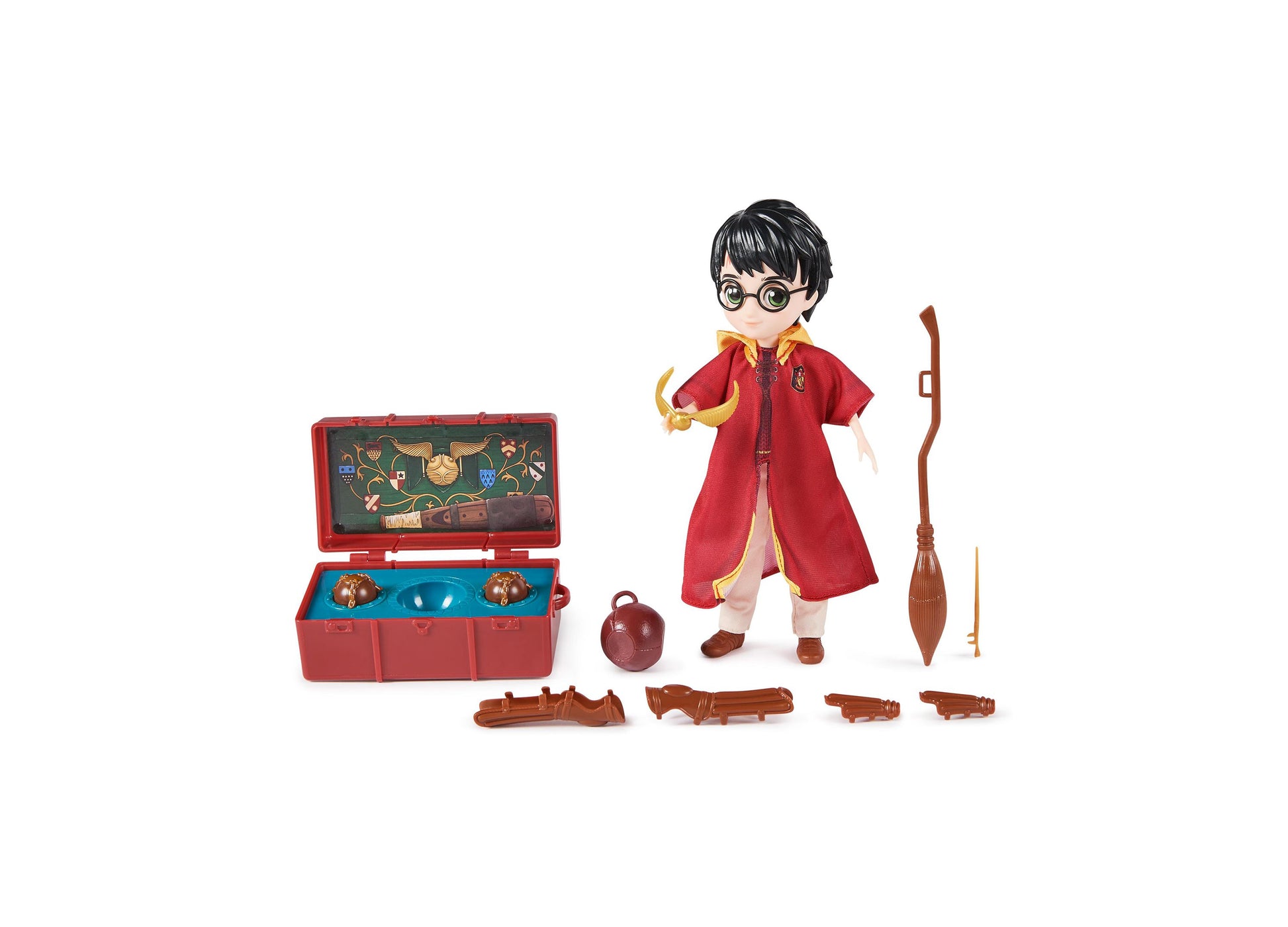 Harry Potter action figure wearing red Quidditch robes and glasses, with red trunk, golden snitch, broomstick, wand, and brown accessories