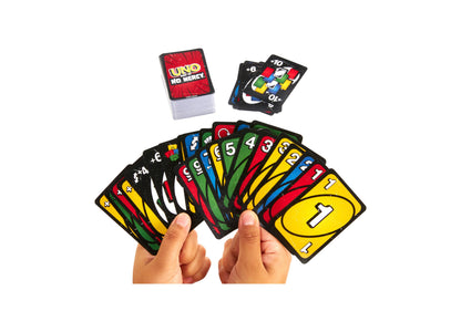 UNO Show 'Em No Mercy card game with colorful numbered cards fanned in hands and deck box