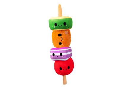 Stacked plush kabob with smiling green popsicle top, orange fuzzy middle, pink striped section, and red fuzzy bottom on wooden stick