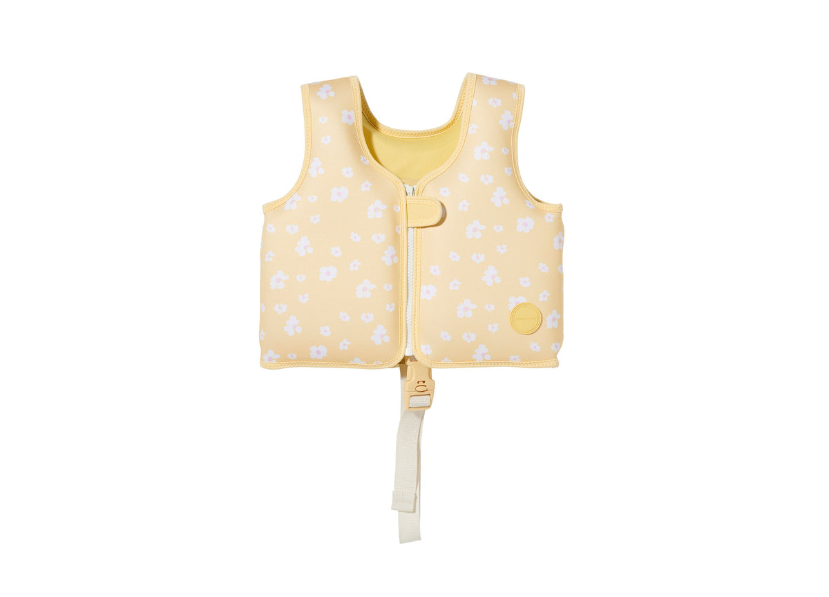 Sunnylife Kids Swim Vest for Ages 2-3 in yellow with white floral pattern, front zip closure and adjustable safety strap