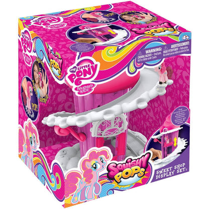 My Little Pony Squishy Pops Sweet Shop Display Set with pink playhouse, white cloud canopy, and pony figures on bright magenta packaging
