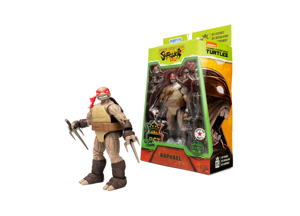 Teenage Mutant Ninja Turtles Raphael 5-inch action figure with red mask and sai weapons, shown next to its green and orange retail packaging labeled 'Glow in th