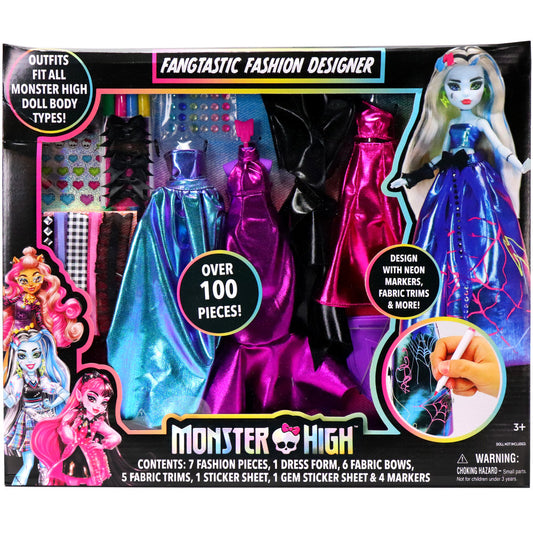 Monster High Fangtastic Fashion Designer kit showing doll with blue and neon pink outfit, colorful fabric pieces, markers, stickers, and design accessories on b