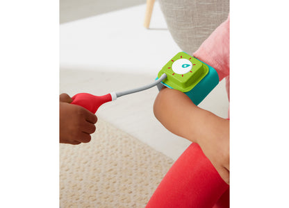 Fisher-Price Doctor Role Play Medical Kit with child holding stethoscope and wearing green and teal blood pressure cuff