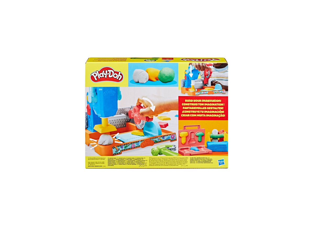 Play-Doh Stamp N Saw Tool Bench Creativity Set with blue workbench, saw tool, stamper, and colorful Play-Doh accessories