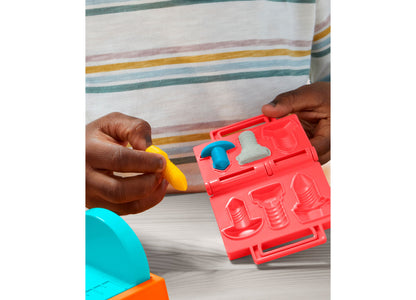 Play-Doh Stamp N Saw Tool Bench set with red case, yellow stamper tool, and blue stamp piece