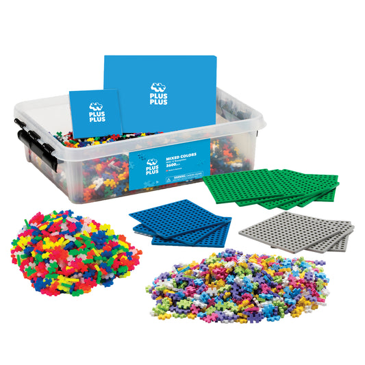 Plus-Plus building set with 3600 mixed-color pieces, clear storage container, instruction cards, and 12 baseplates in green, blue, and gray
