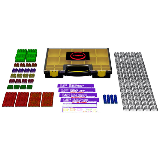 E-Blox Circuit Blox Lights Starter set contents including black and yellow storage case, colorful plastic building blocks in green, red, purple, and brown, gray
