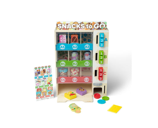Snacks to Go wooden vending machine play set with colorful dispensing slots, interactive coin slots, pretend snack boxes, and accessories including colored coin