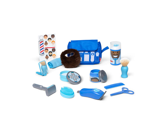 Barber shop play set with blue accessories including clippers, brush, comb, scissors, soap containers, towel, barber pole chart, and carrying bag