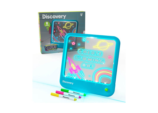 Discovery Kids Neon Glow Light-Up Art Board with turquoise frame, glowing neon designs including rocket and planet, includes three colorful markers