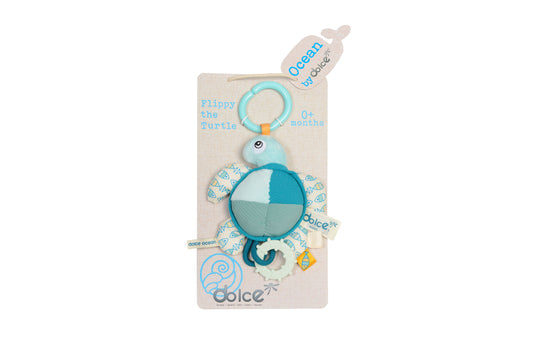 Flippy the Turtle by Dolce, textured plush toy with turquoise ring attachment, segmented shell, and attached sensory elements, for 0+ months