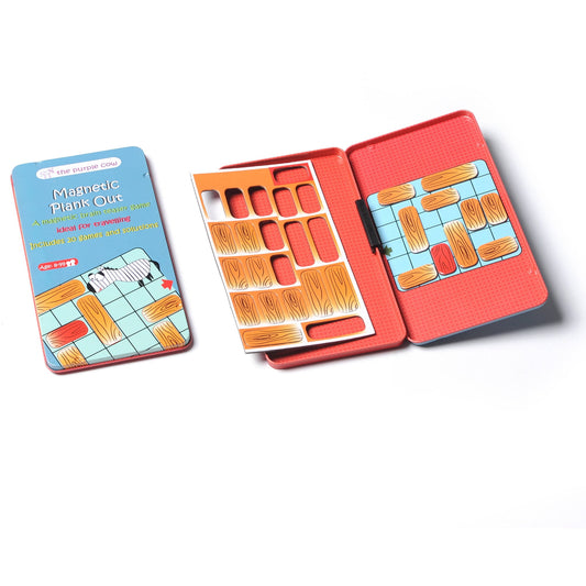 The Purple Cow Magnetic Plank Out travel game set showing blue box packaging and red magnetic case with wooden plank puzzle pieces and game board