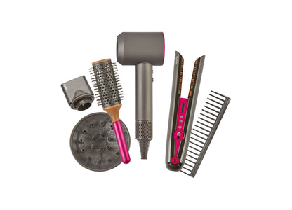 Dyson Style Set toy hair styling tools with pink and gray accessories