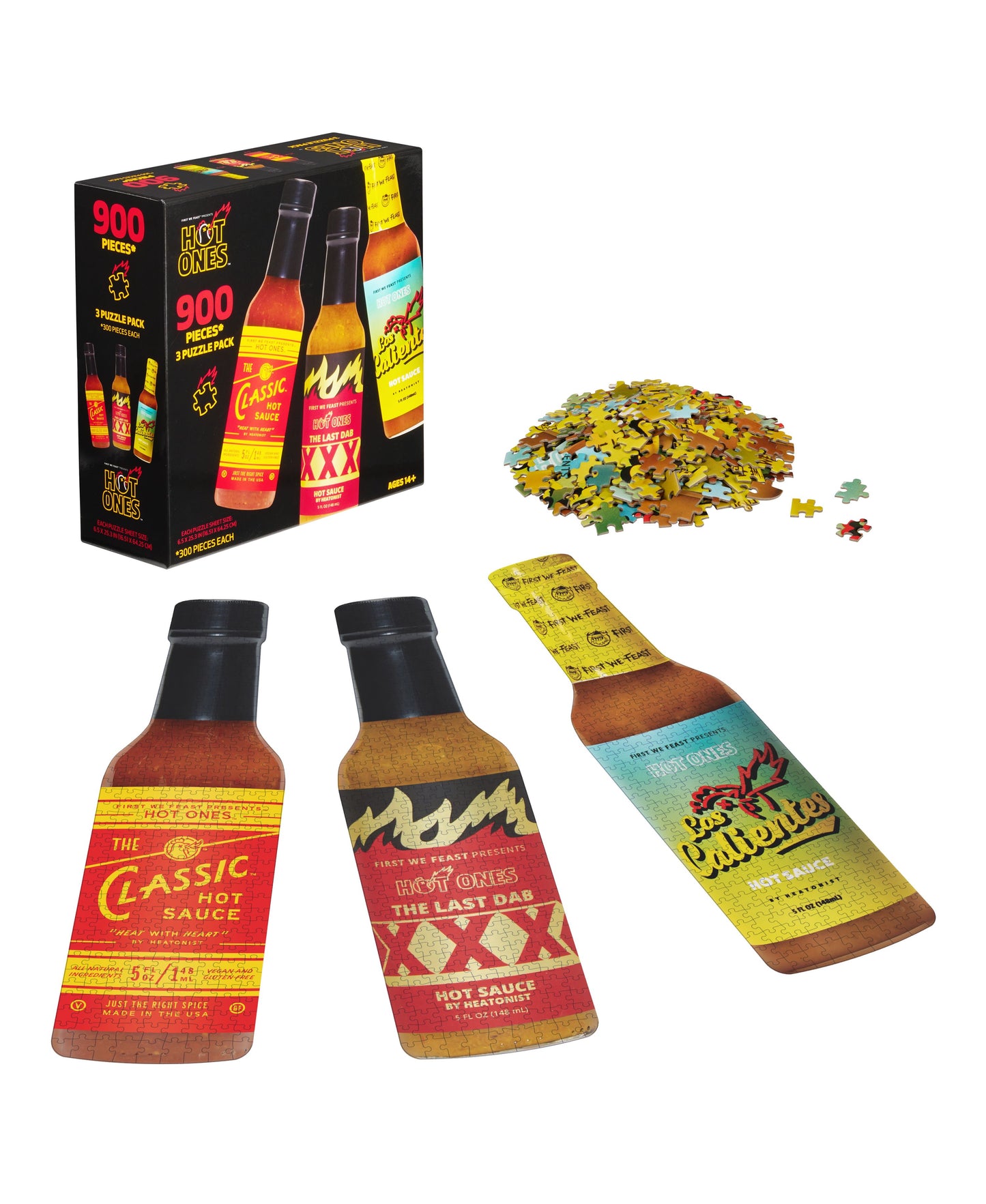 Hot Ones Challenge 3-Pack Bottle-Shaped Puzzles with 900 pieces total, showing puzzle box, three hot sauce bottle-shaped puzzle containers, and assembled yellow