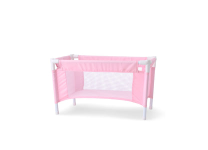 Pink and white doll crib with mesh sides and white legs on plain background