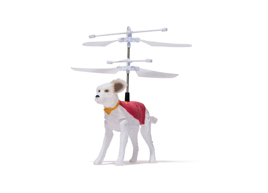 White flying dog action figure with brown ear markings and red cape, with sensor-controlled helicopter blades mounted on back