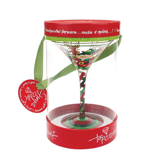 Hand-painted holiday mug with red rim and green ribbon bow, featuring elf character and striped stem, red circular tag attached