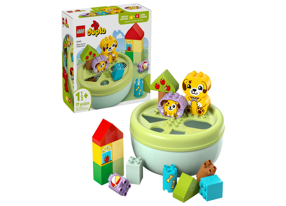 LEGO DUPLO Puppy House Shape Sorter set with green and white dome base, yellow and purple puppy figures, colorful building blocks, and small house structure