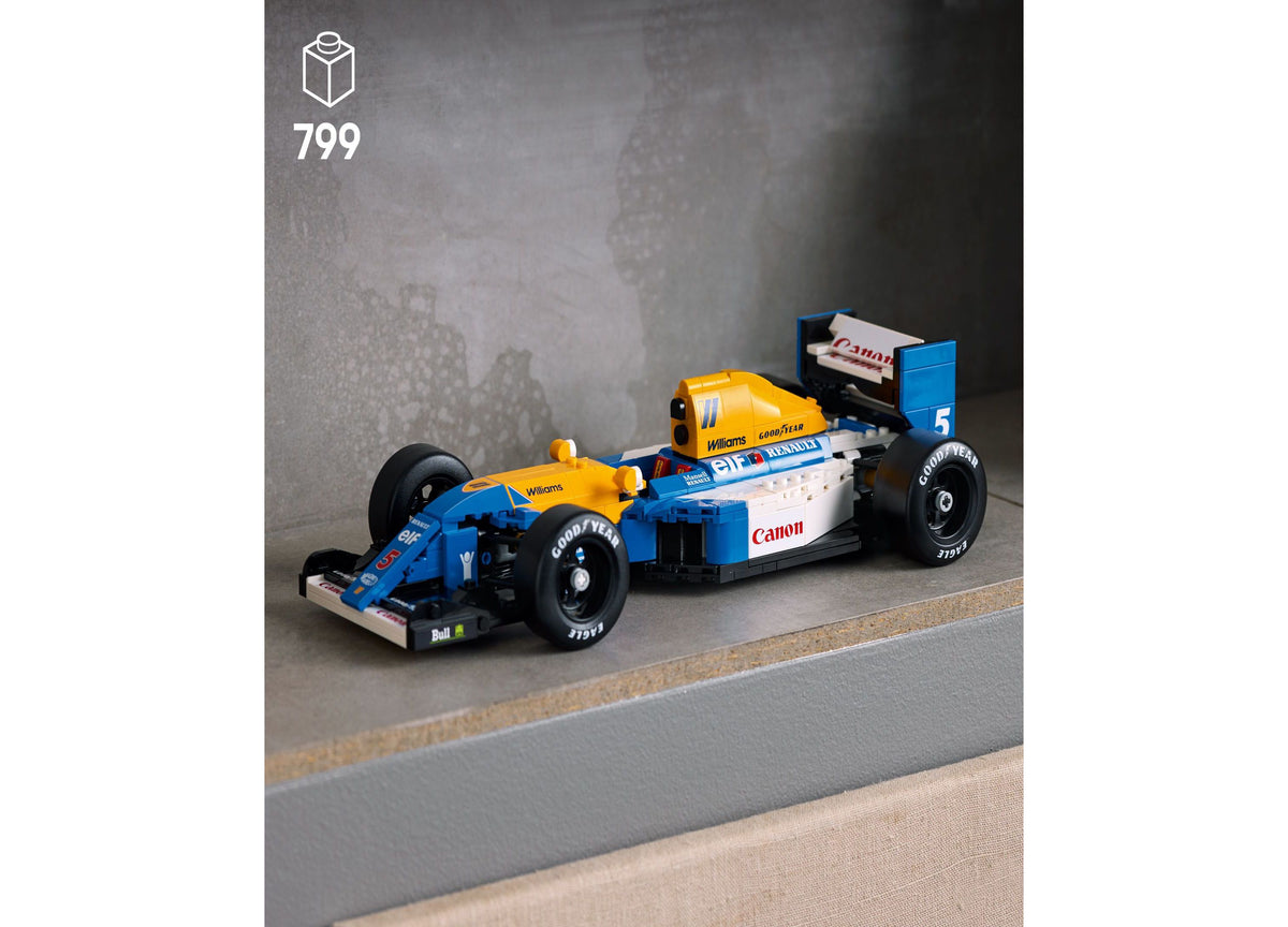 LEGO Icons Williams Racing FW14B model car set with blue and yellow race car, podium, and minifigure