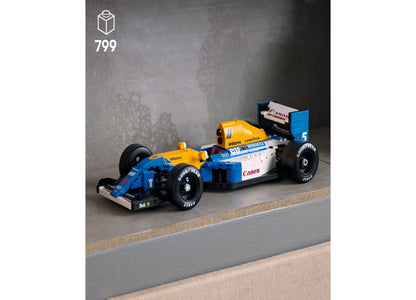 LEGO Icons Williams Racing FW14B model car set with blue and yellow race car, podium, and minifigure