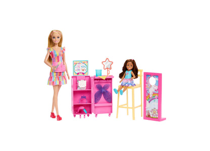 Barbie Day at the Fair Playset with blonde doll in rainbow dress, brunette small doll, pink storage unit with accessories, yellow chair, star decoration, and mi