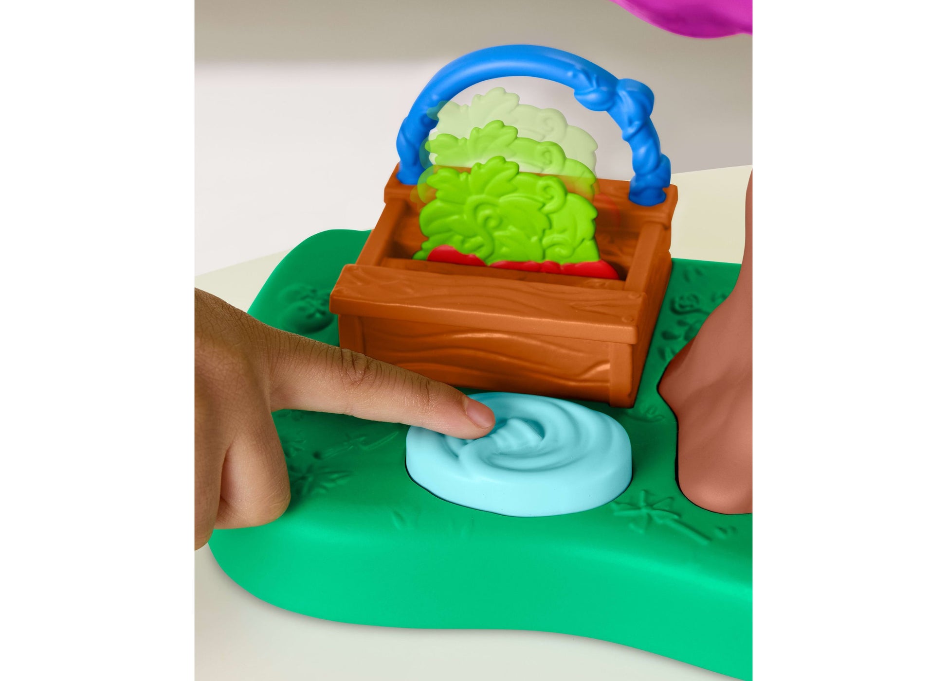 Barney's World Treehouse Playset with green base, brown treehouse, and blue handle