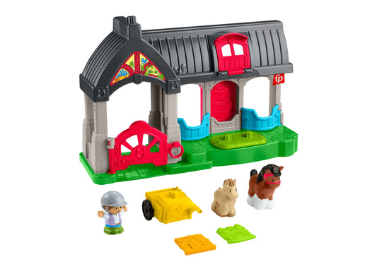 Little People Friendly Horses Stable playset with red and black barn, green base, includes small figure, horse, llama, cow, and yellow accessories
