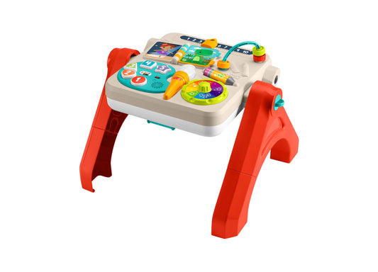 Fisher-Price Laugh and Learn 4-in-1 Activity Table with red legs, beige tabletop featuring turquoise and colorful interactive buttons, dials, and learning games