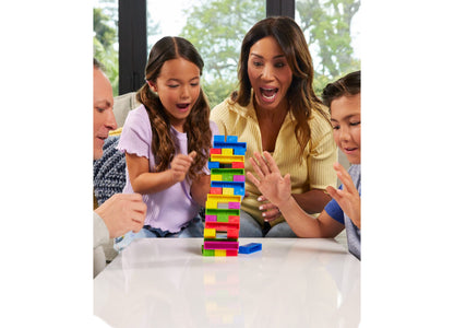 UNO Stacko Color & Number Matching Block Game with colorful stacked blocks in red, yellow, blue, and green during fam...
