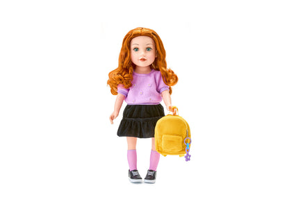 Journey Girls 18 inch doll with orange wavy hair, wearing lavender top, black pleated skirt, pink socks, and black sneakers, holding yellow backpack with purple