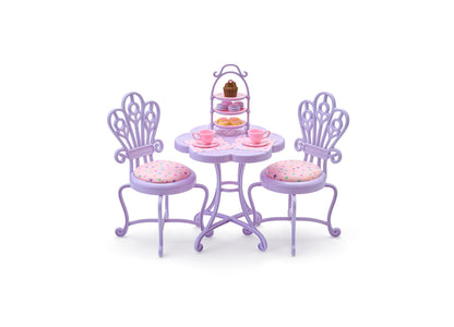 Purple ornate tea party playset with two chairs, round table, tiered pastry stand, teacups, and food accessories