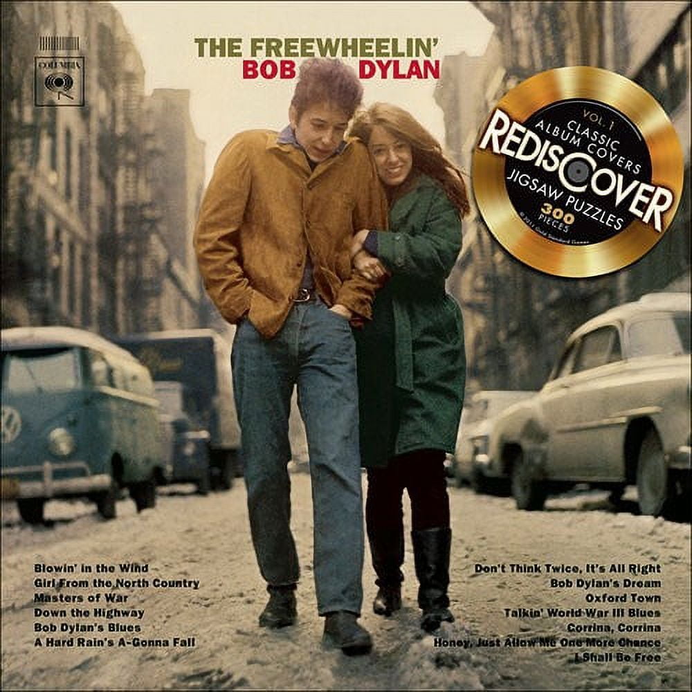 The Freewheelin' Bob Dylan 300-piece jigsaw puzzle box featuring vintage album cover art with two people on a city street, includes gold vinyl record redescover