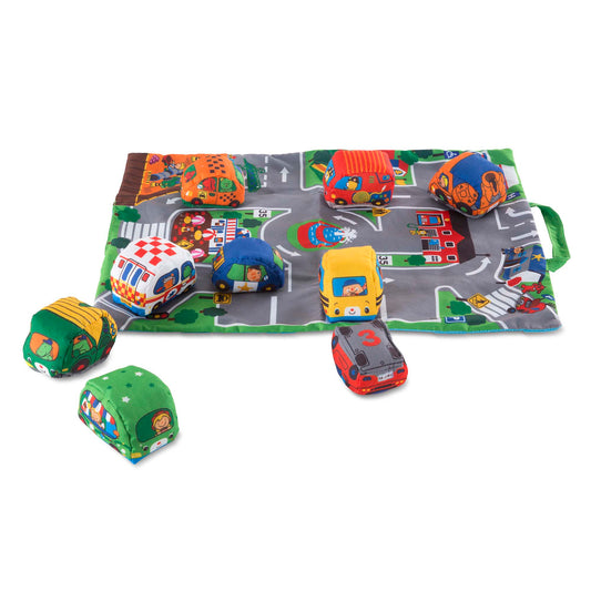 Melissa & Doug Take-Along Town Play Mat with colorful soft fabric cars on a street scene playmat, including white checkered police car, yellow taxi, blue police